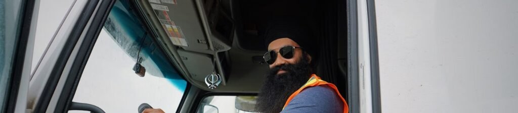 Truck driver behind the wheel of his truck